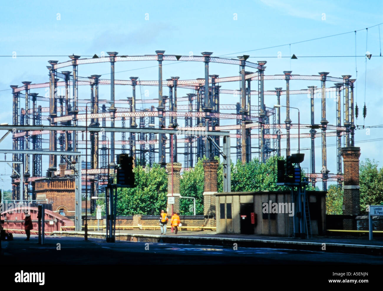 Three Gasometers or Gas Holders, King's Cross Station London England Great Britain Stock Photo