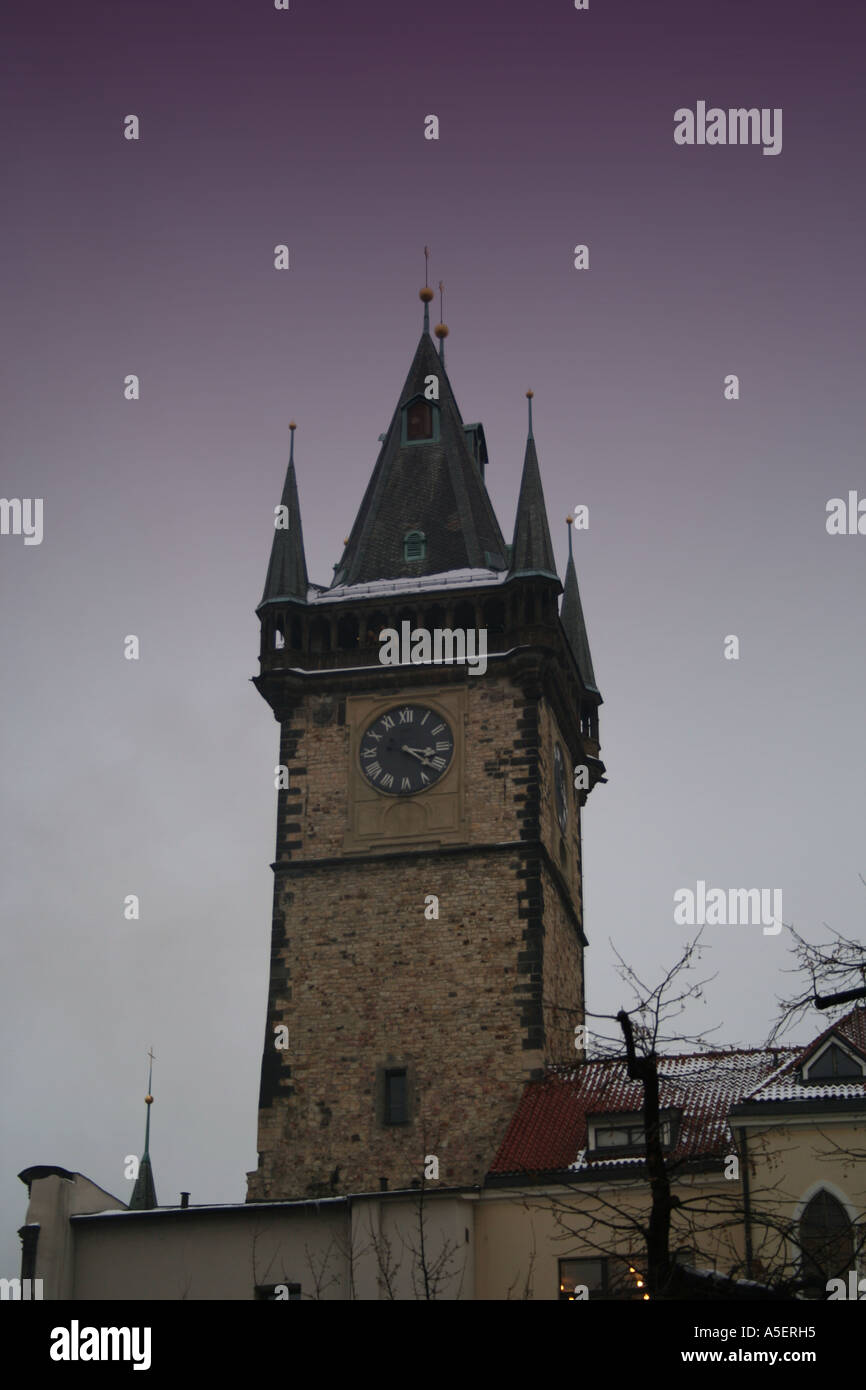 Historic City Hall on Old Town Square in Prague under a twilight sky ...