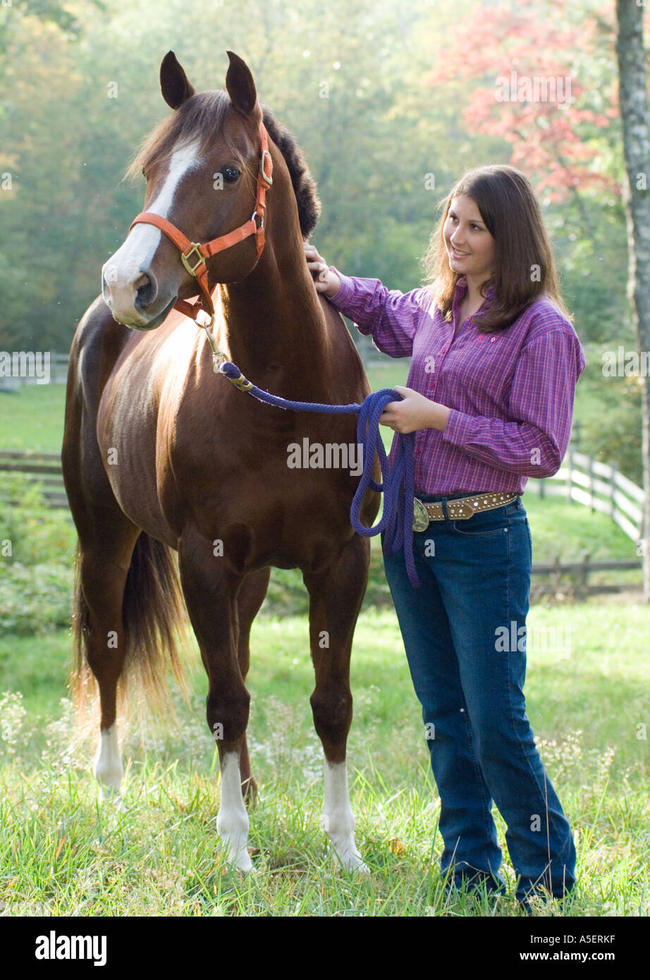 Young woman posing horse mare hi-res stock photography and images - Alamy
