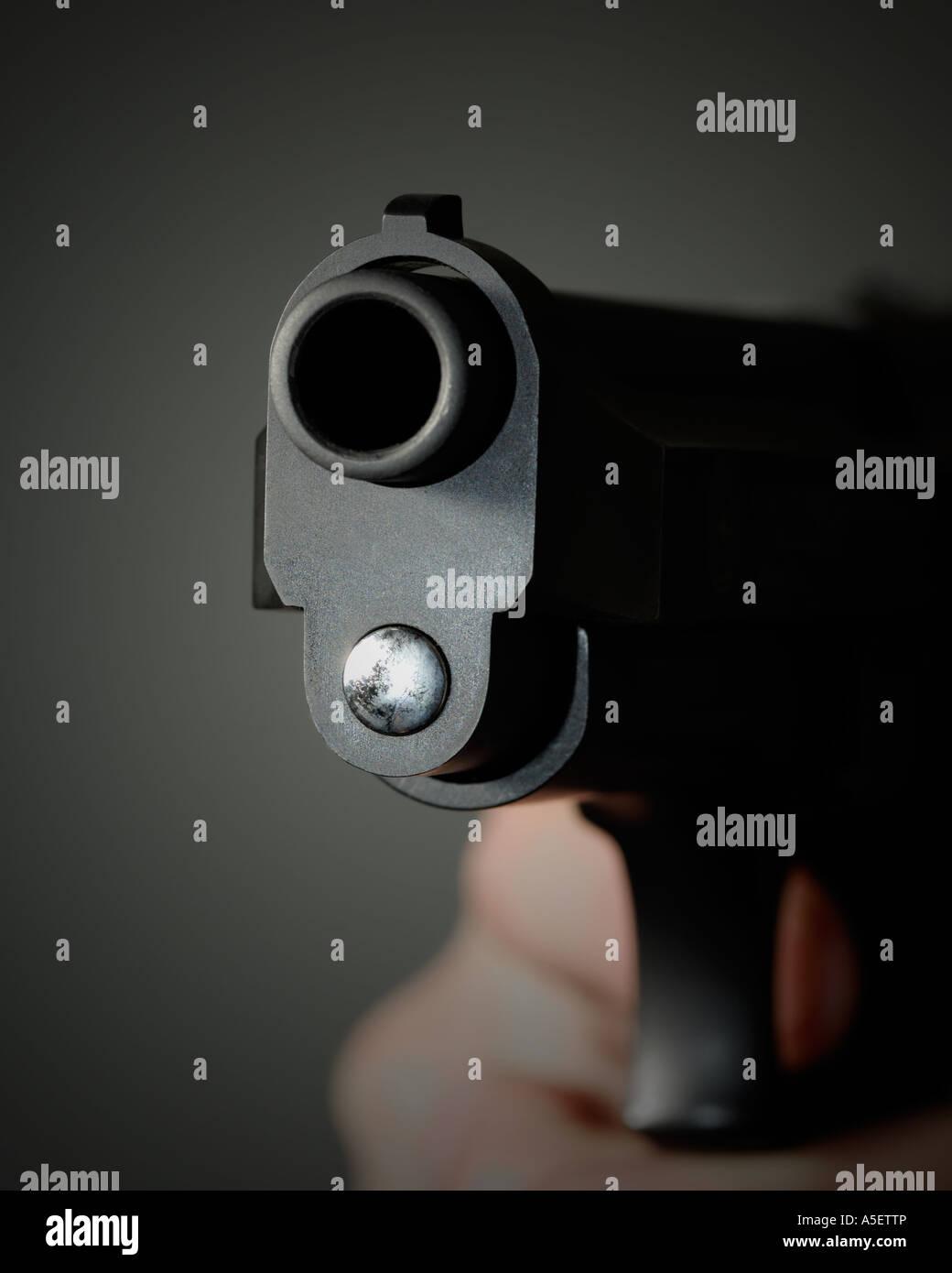 muzzle of a pointed pistol Stock Photo Alamy