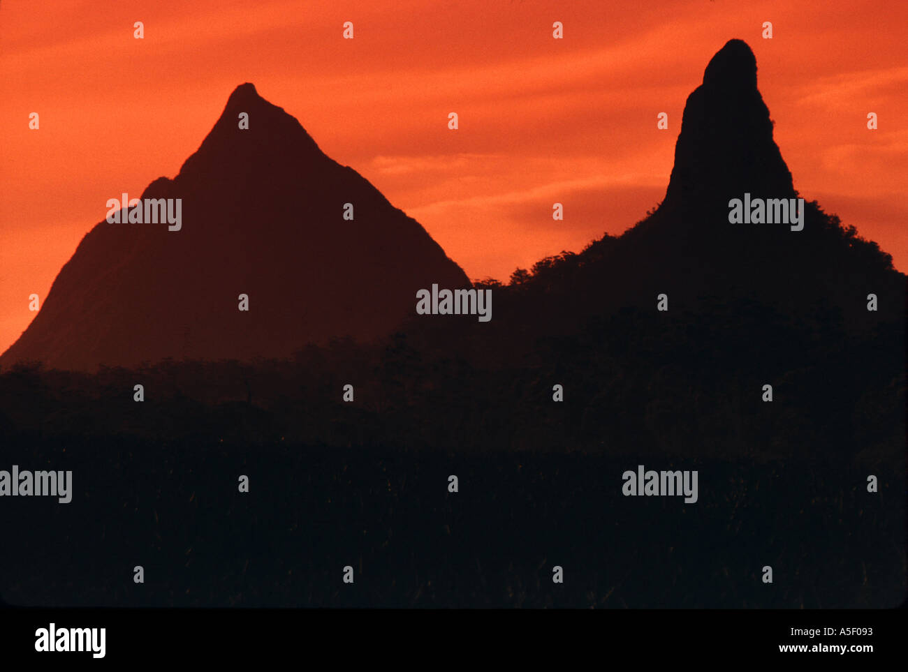 The Glasshouse Mountains at sunset Queensland Australia Stock Photo