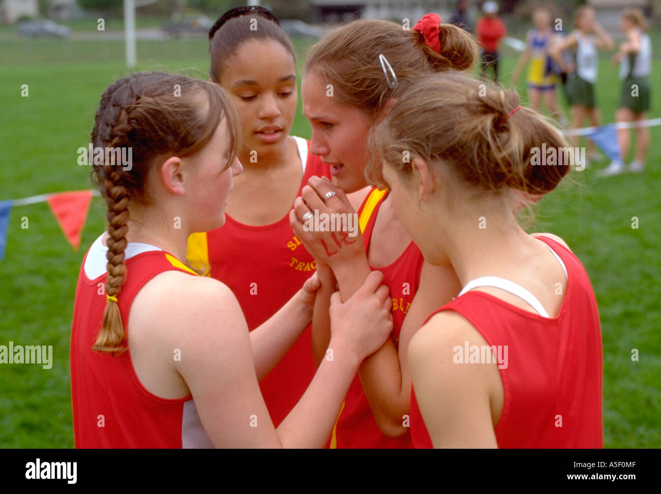 Girls Age 15 Comforting Teammate After Track Meet Race Cottage