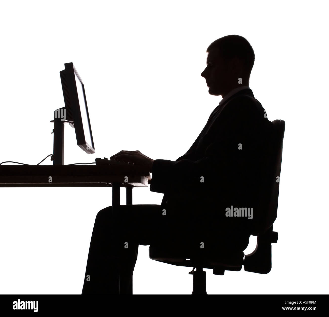 isolated on white silhouette of man working computer Stock Photo