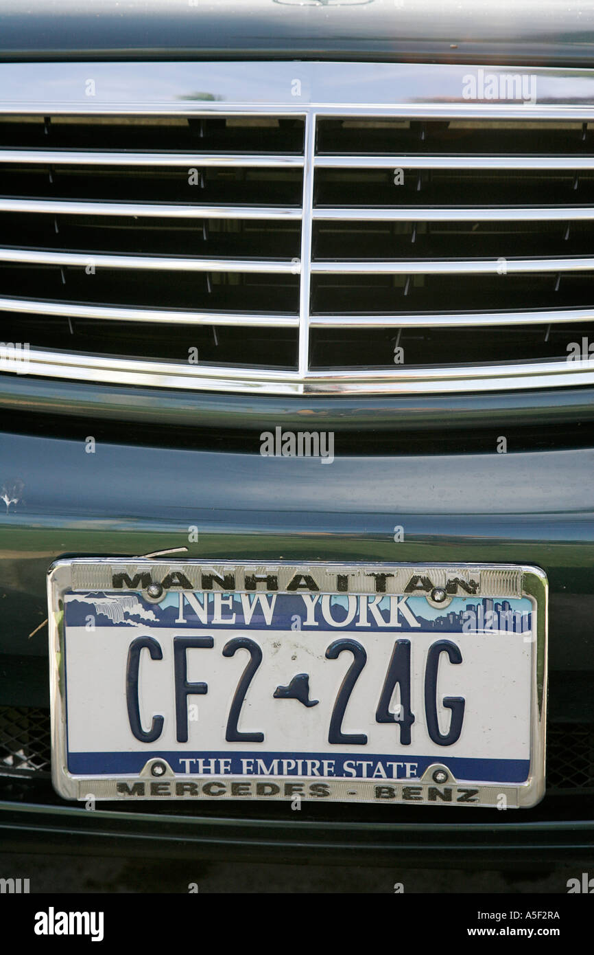 License plate orange white rectangle rectangular blue yellow red curve