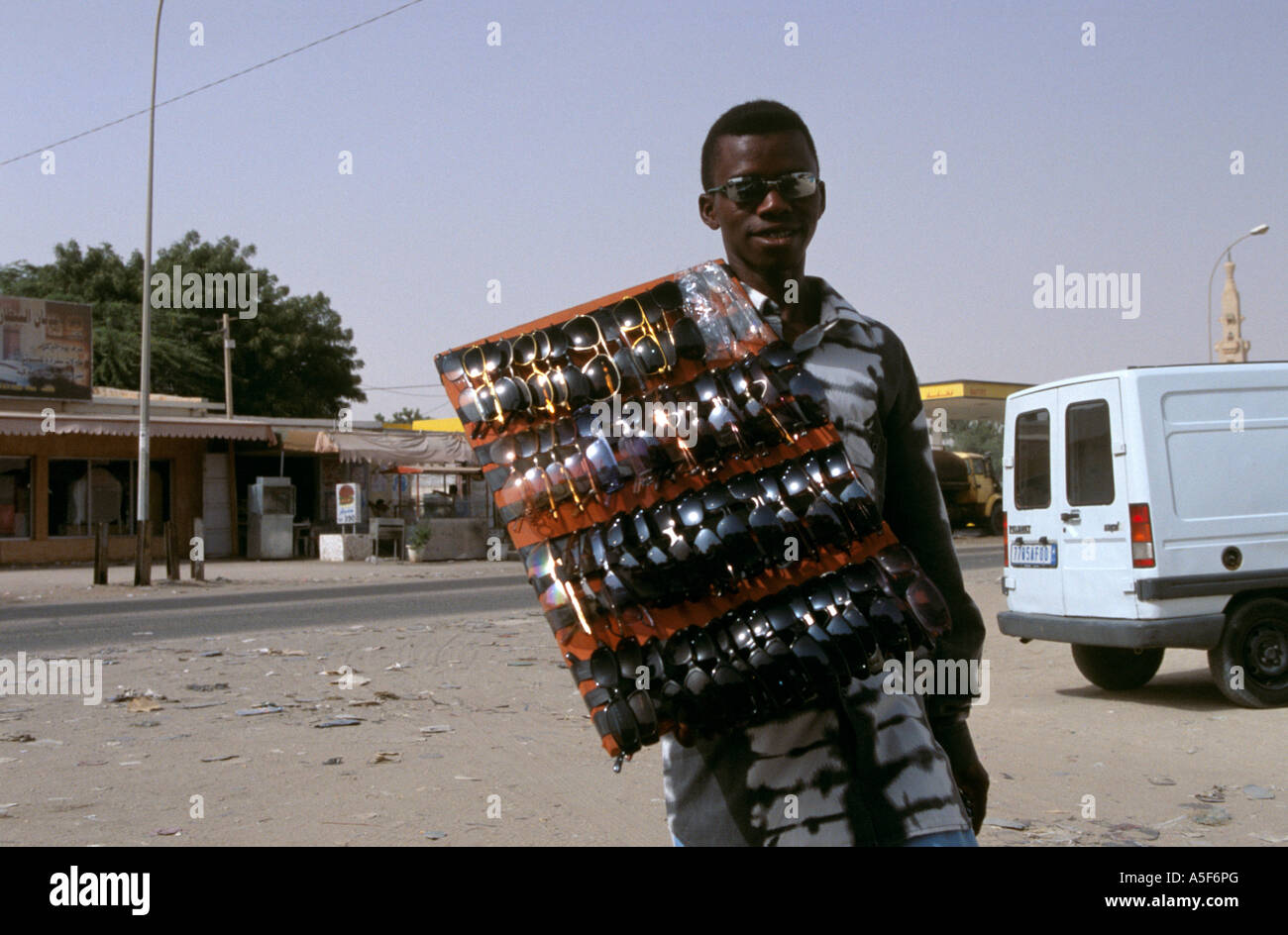 A vendor selling sunglasses in Nouakchott Mauritania Stock Photo