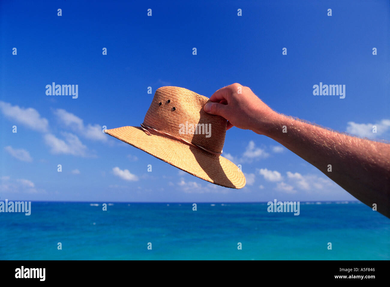 Hand on hat hi-res stock photography and images - Alamy