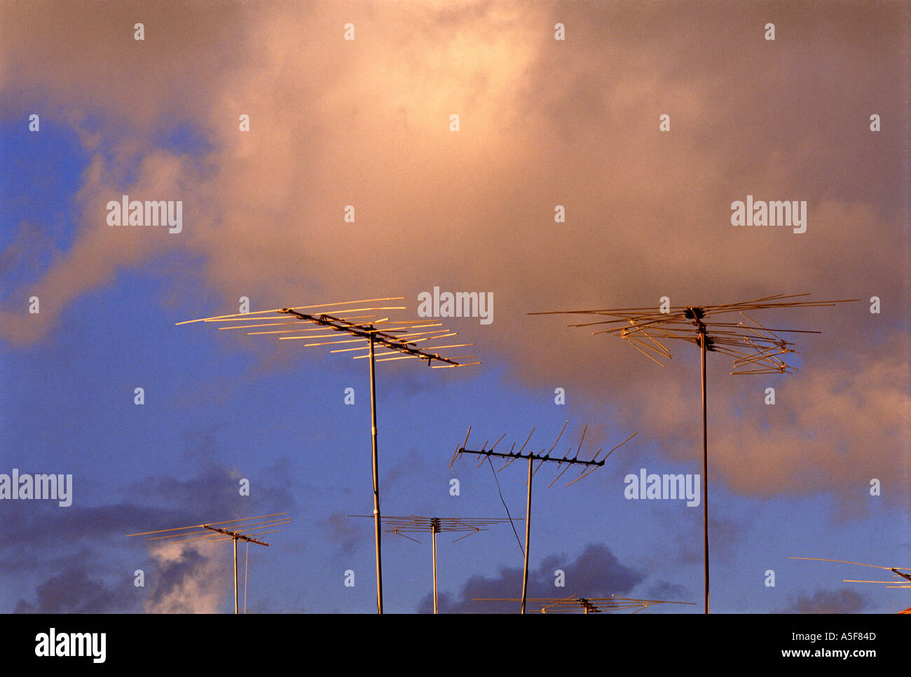 Television antenna and clouds in St Martin French West Indies Caribbean Stock Photo