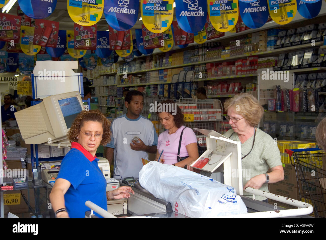 Customers in the check out line of a super market in El Calafate