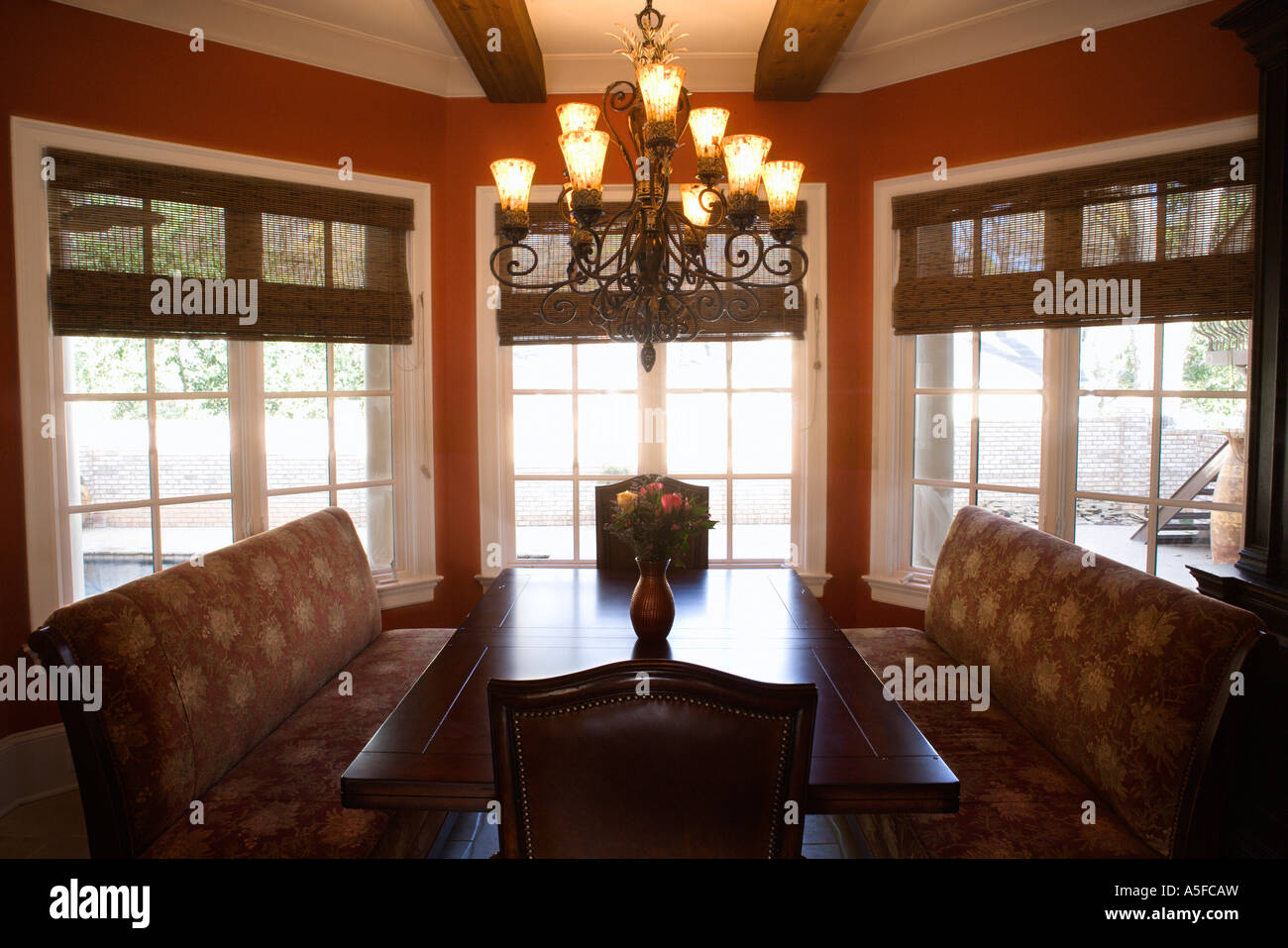 Ceiling lighting table chairs hi-res stock photography and images - Alamy