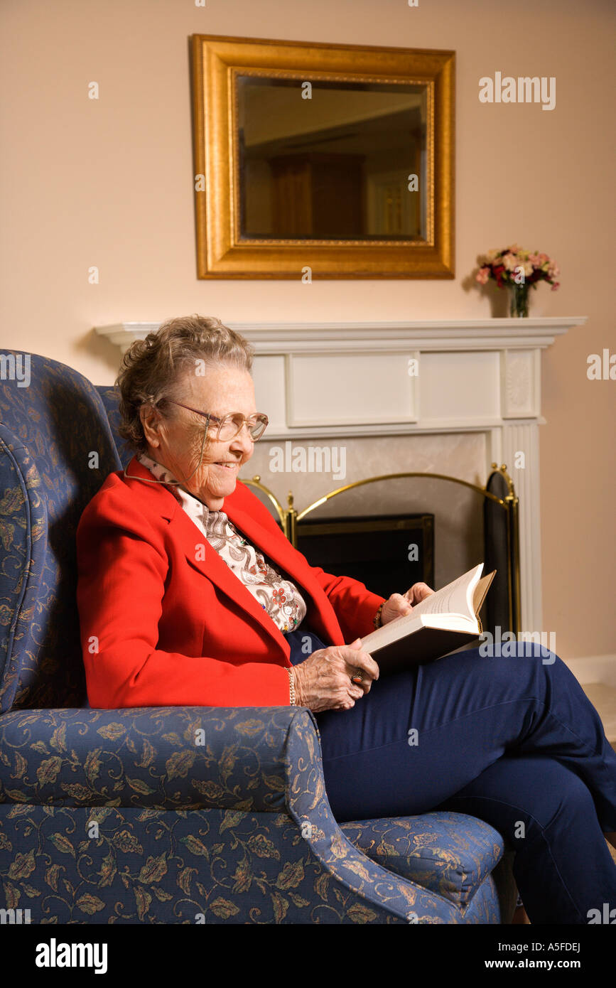 Elderly woman relaxing reading hi-res stock photography and images - Alamy