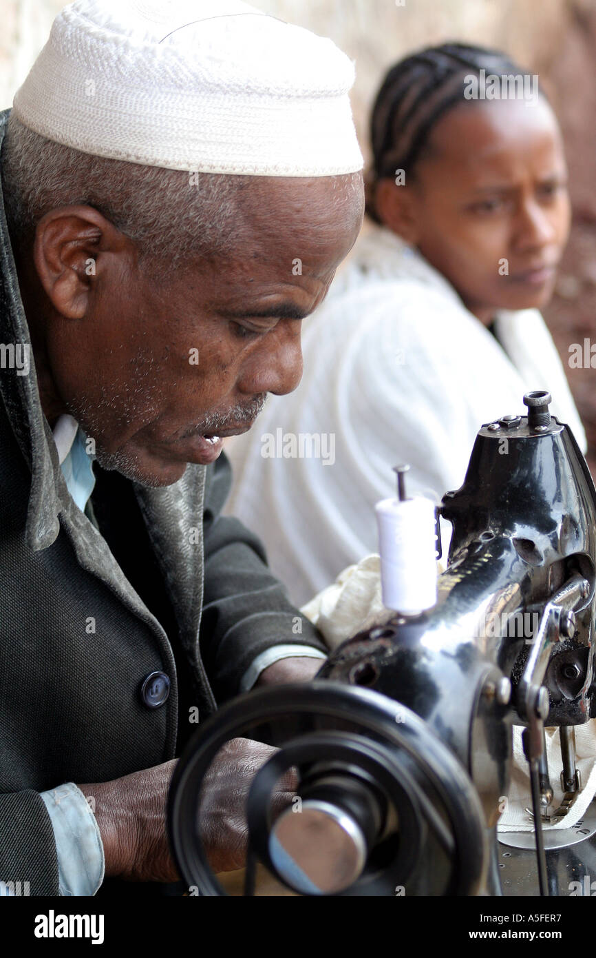 Addis Ababa, Ethiopia, Muslim man sewing on the street with an old