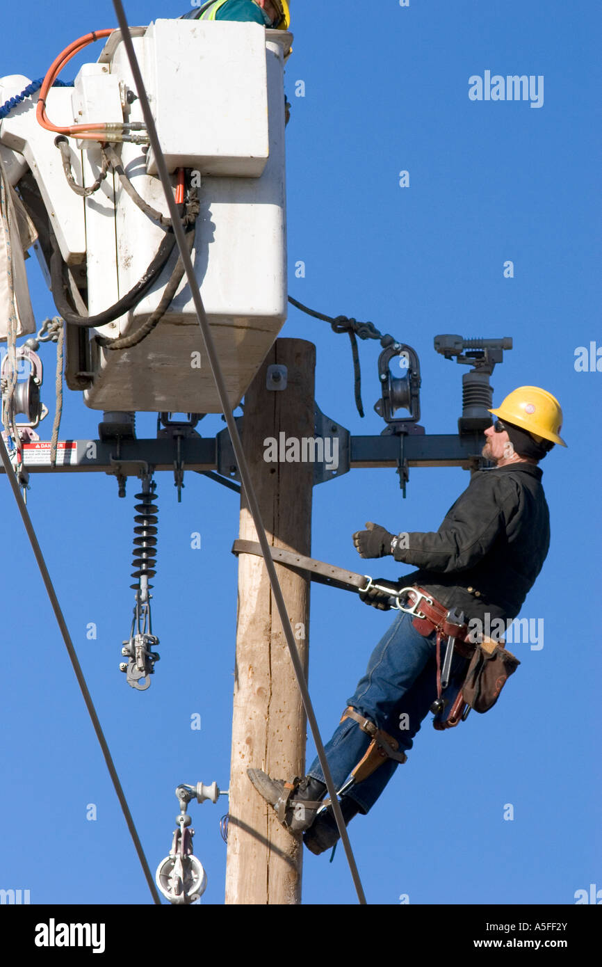 Electric power lineman installing new lines in Boise Idaho Stock Photo Alamy