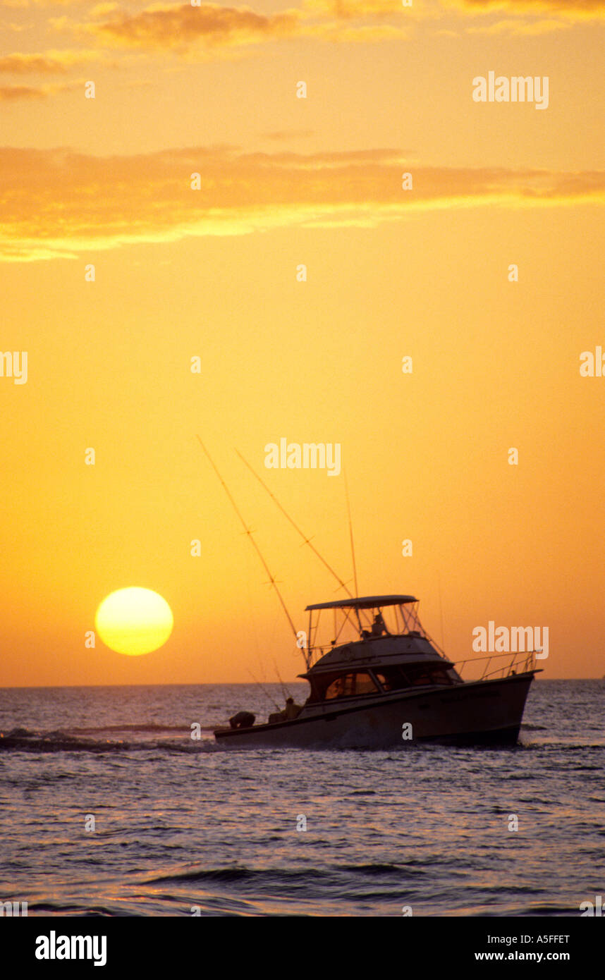 A fishing boat and sunset in Key West Florida Stock Photo - Alamy