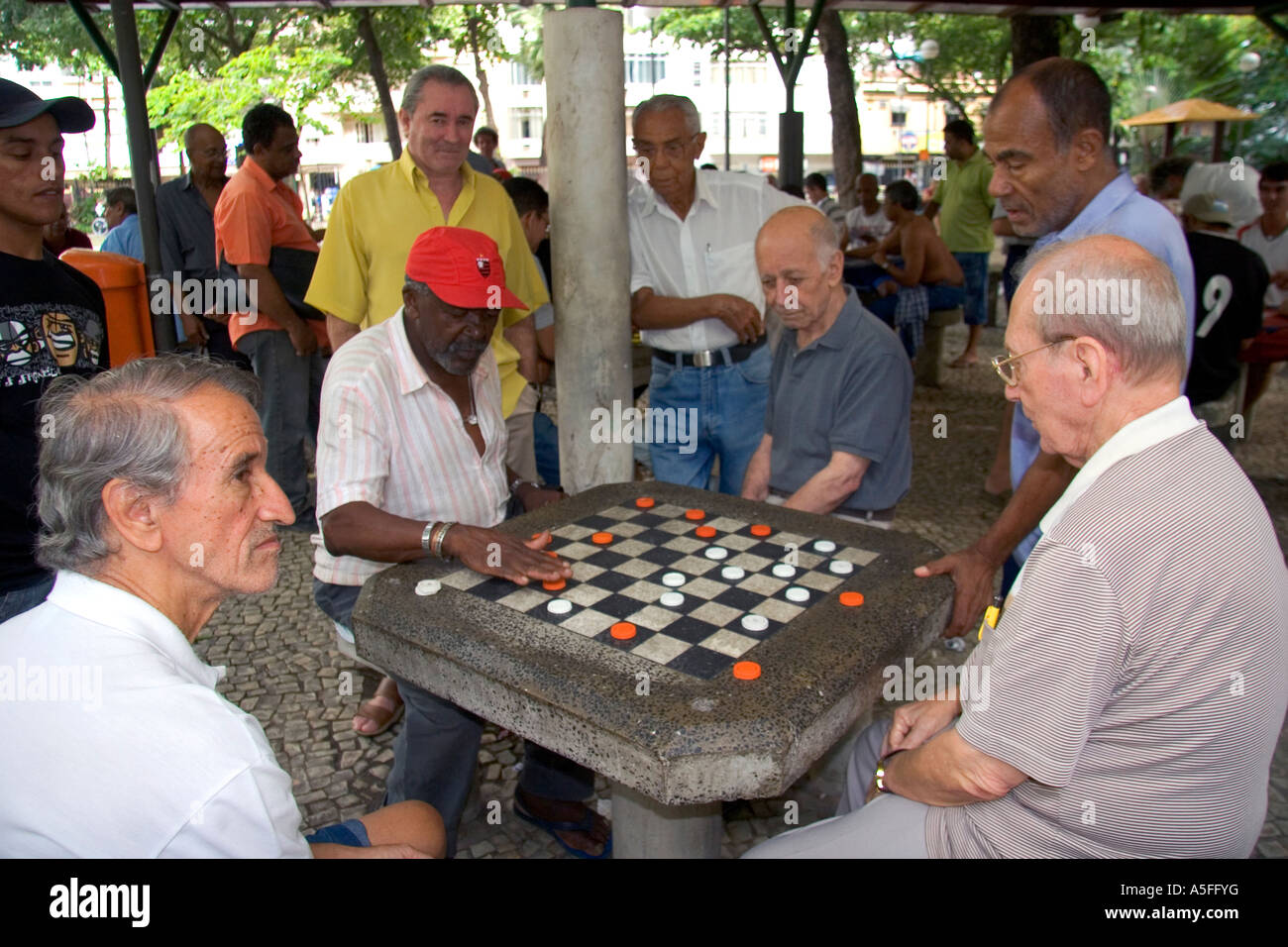 Elderly men playing checkers at a park in Rio de Janeiro Brazil Stock Photo