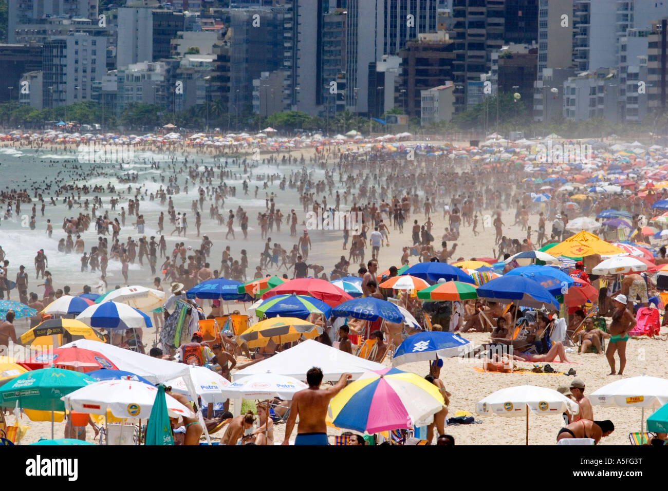 Crowed beach scene at the Ipanema Beach in Rio de Janeiro Brazil Stock Photo