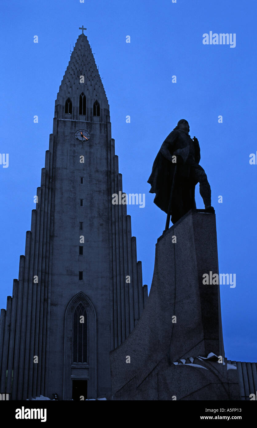 Statue of explorer Leif Eriksson looking west to the ocean Outside Hallgrimurs Church Reykjavik Iceland Hallgrimskirkja Stock Photo