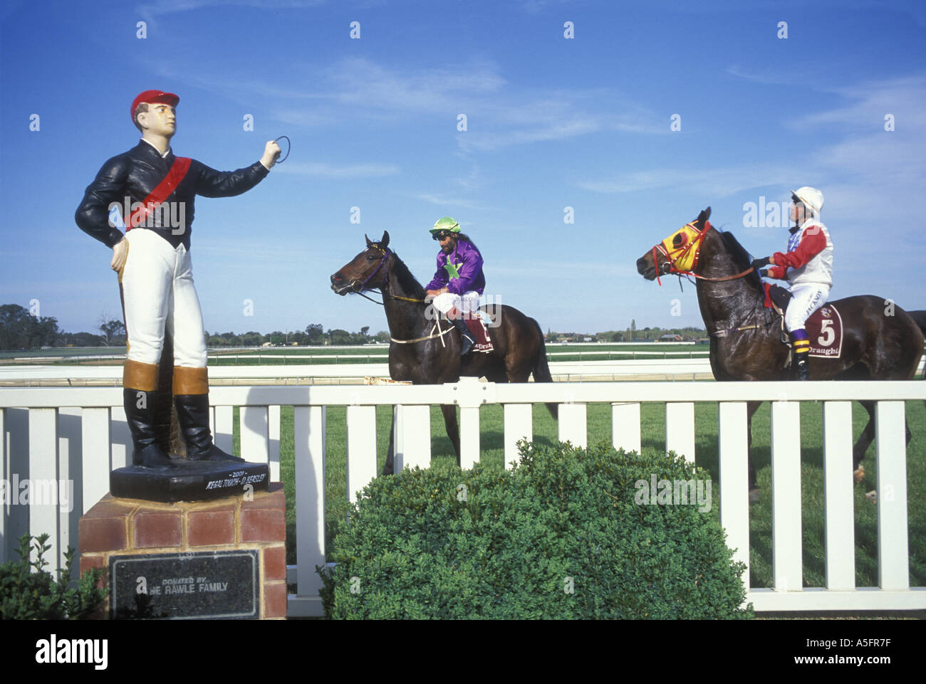 Australia New South Wales Wagga Wagga Jockeys ride past paddock after