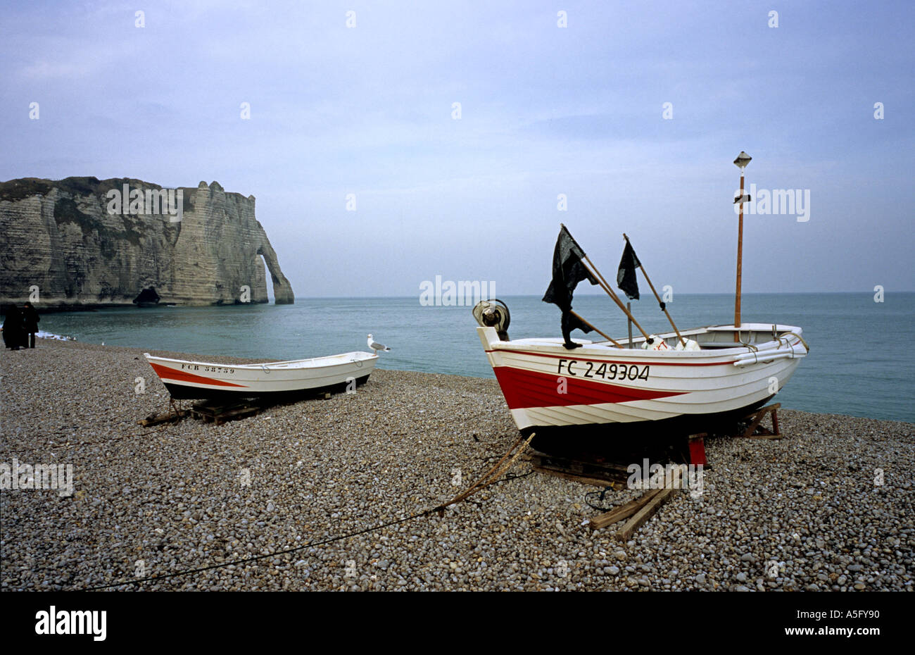 France Etretat fishing boats on the sea shore beach Stock Photo - Alamy