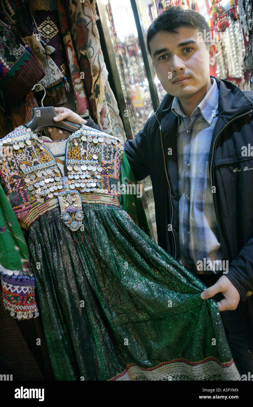 TURKOMAN SALESMAN FROM AFGHANISTAN SHOWING TRADITIONAL DRESS IN THE GRAND BAZAAR, ISTANBUL, TURKEY Stock Photo
