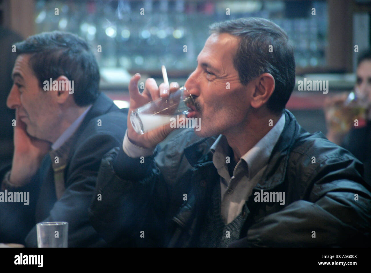 Drinking Raki MAN DRINKING RAKI IN A TRADITIONAL MEYHANE, TURKEY Stock Photo - Alamy