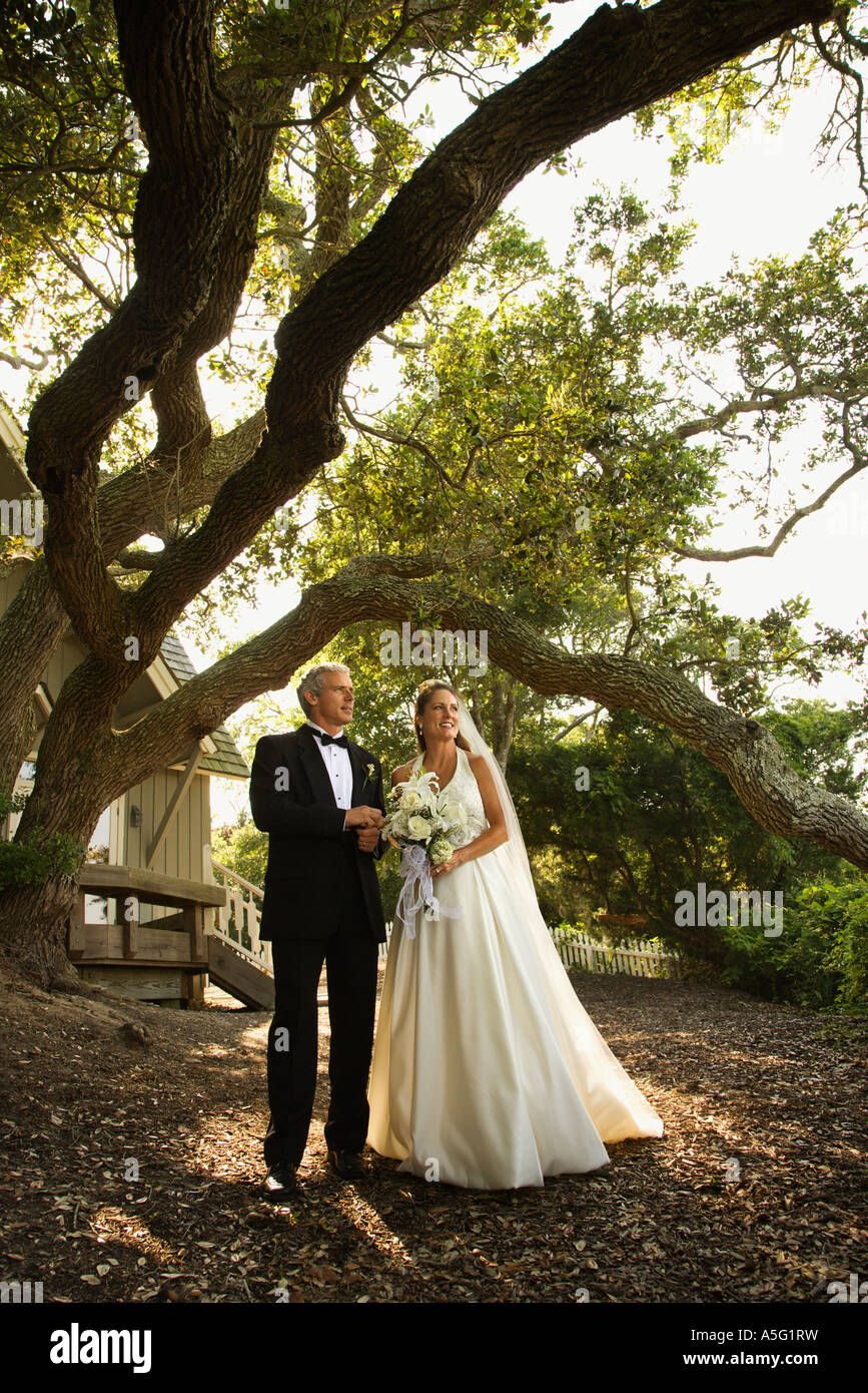 Bride groom standing outdoors hi-res stock photography and images - Alamy