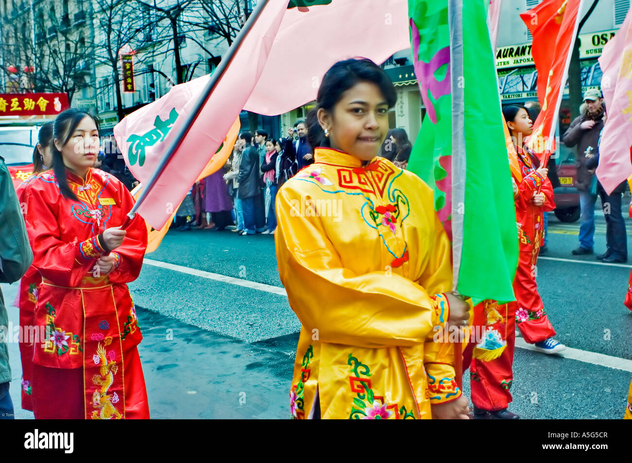 Paris France, People, Street Scene French Asian Female Teens in Traditional Costumes Parading in 'Chinese new years' Carnival in Street Stock Photo