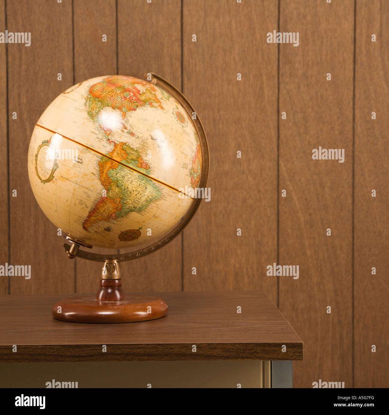 Sill life shot of a vintage world globe sitting on a desk Stock Photo ...