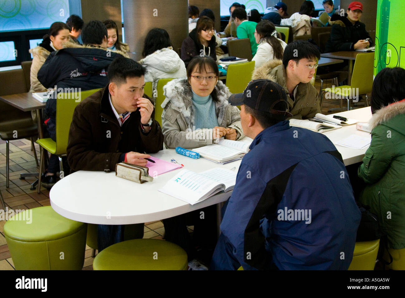 University Students Study together at a Cafe before Class Seoul Korea Stock Photo
