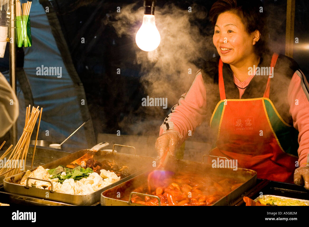 Woman Working An Outdoor Snack Food Cart Seoul Korea Stock Photo Alamy