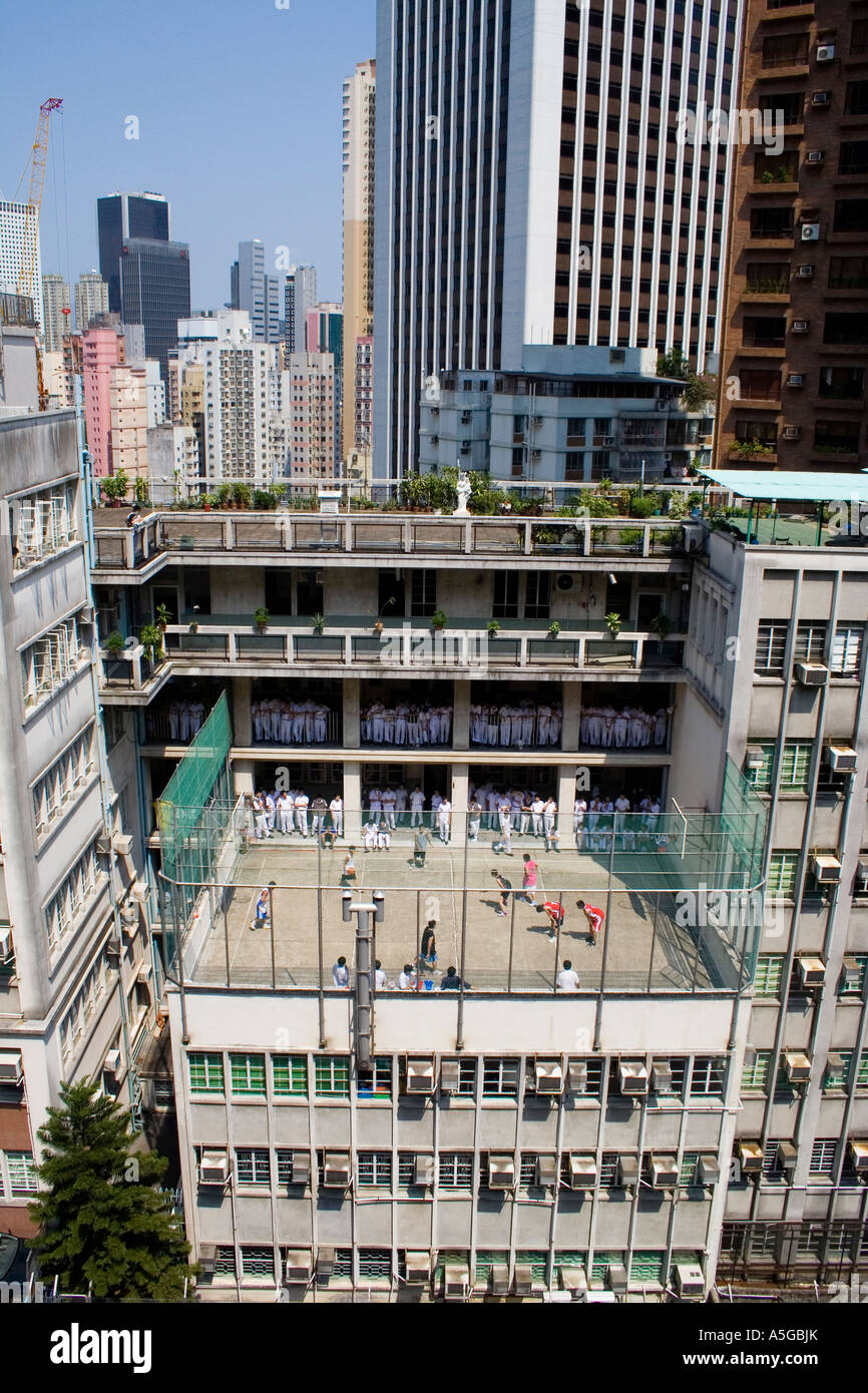 School Boys Watch a Basketball Game from Above Hong Kong China Stock Photo