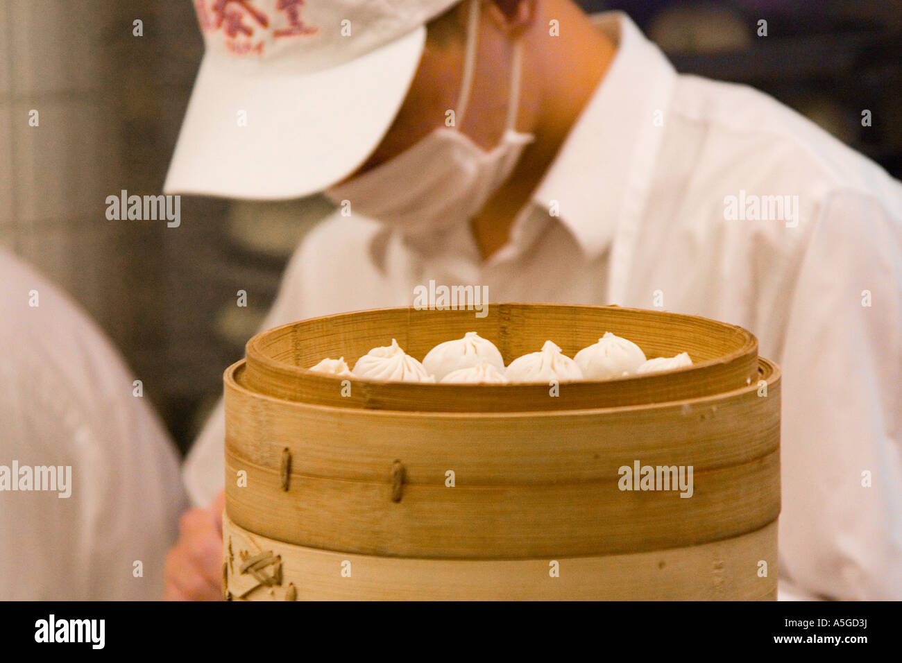 Xiaolongbao or Pork Dumpling Wrapping at Dintaifung Taipei Taiwan Stock