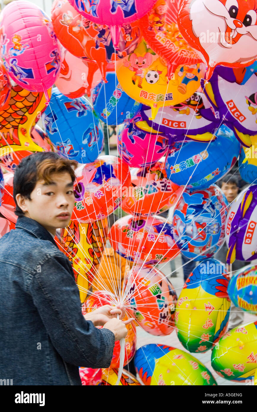 Boy Selling Balloons Guangzhou China Stock Photo