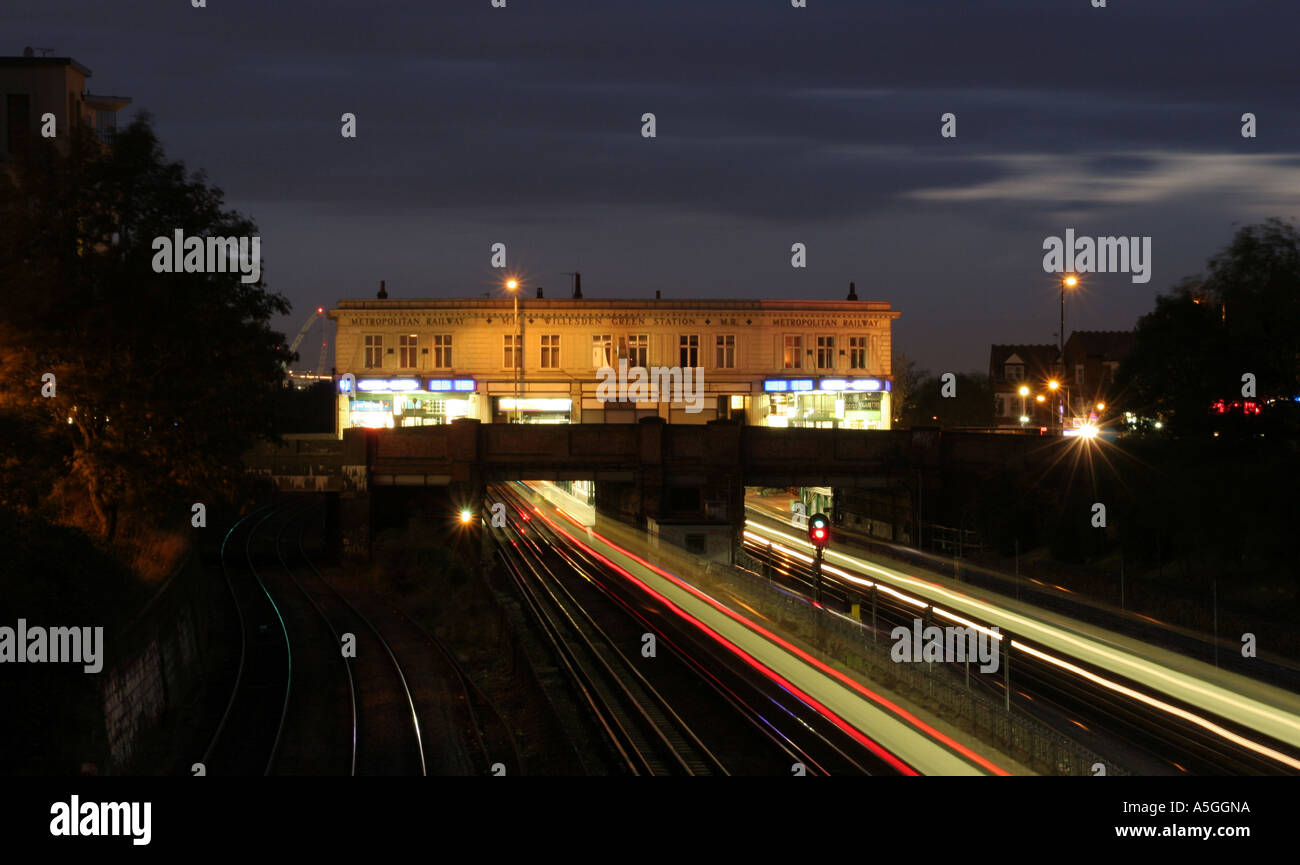 Willesden Green tube station at night with the Wembley Stadium Arch in