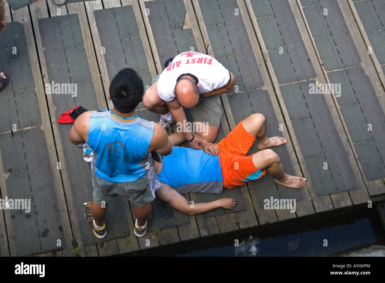 Man performing first aid Stock Photo - Alamy