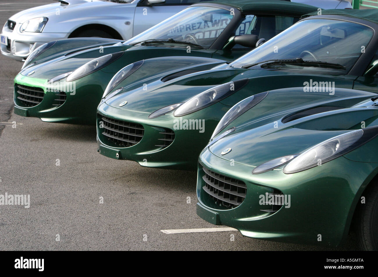 Close up of three lotus sports cars lined up Stock Photo