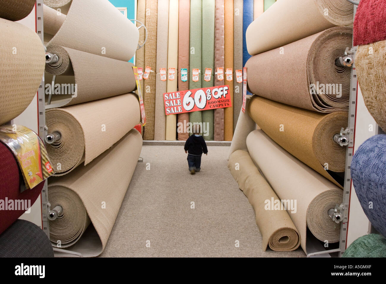 Carpets and rugs inside a carpet warehouse Stock Photo Alamy