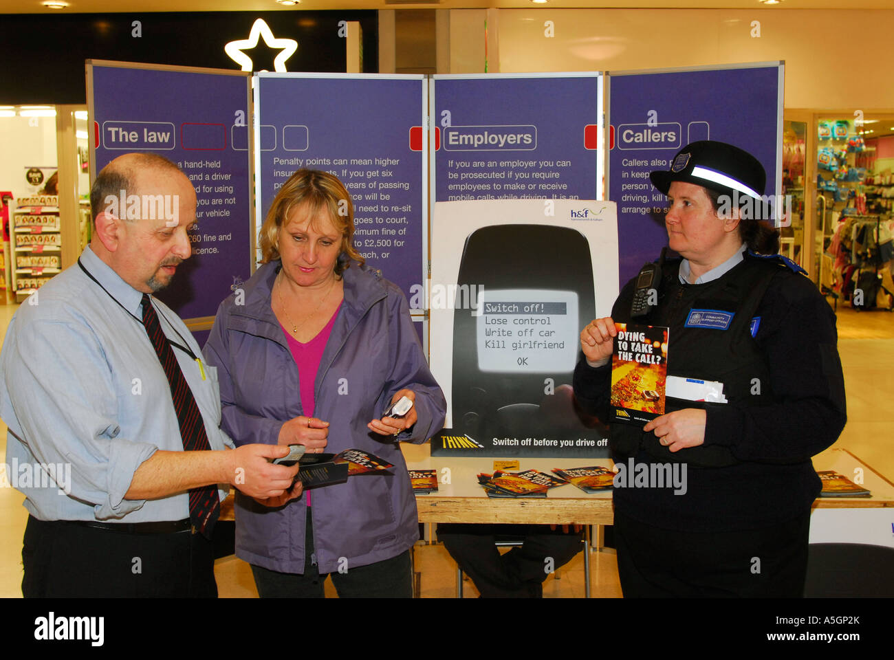 Local Authority Road Safety Officer & PCSO at Hammersmith Shopping Centre educating public