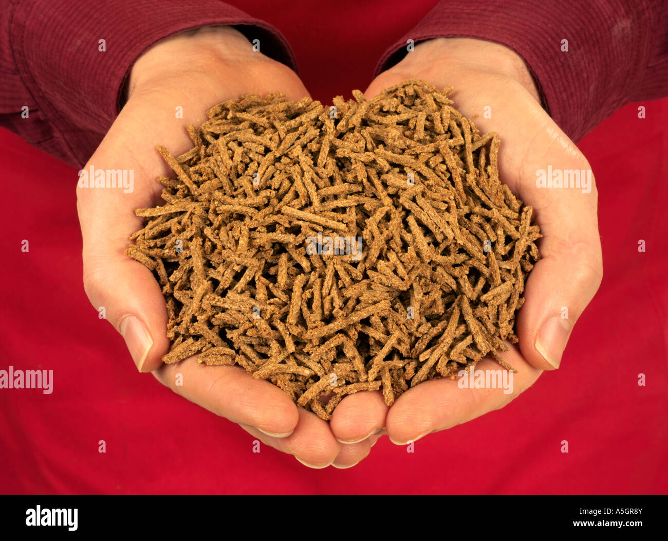MAN HOLDING ALLBRAN CEREAL Stock Photo