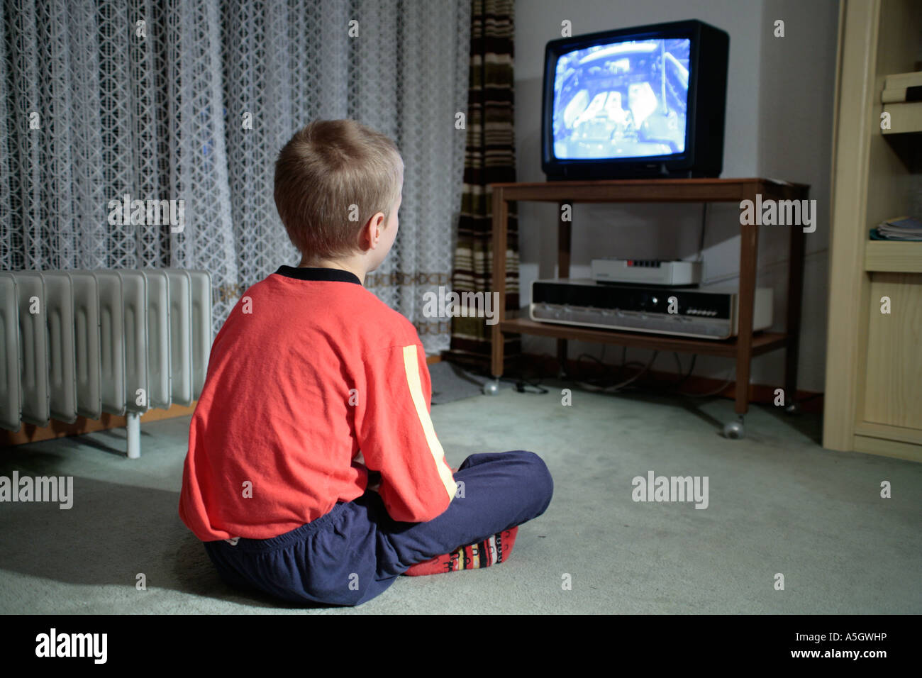 Portrait Of A Young Boy Watching Television Stock Photo Alamy