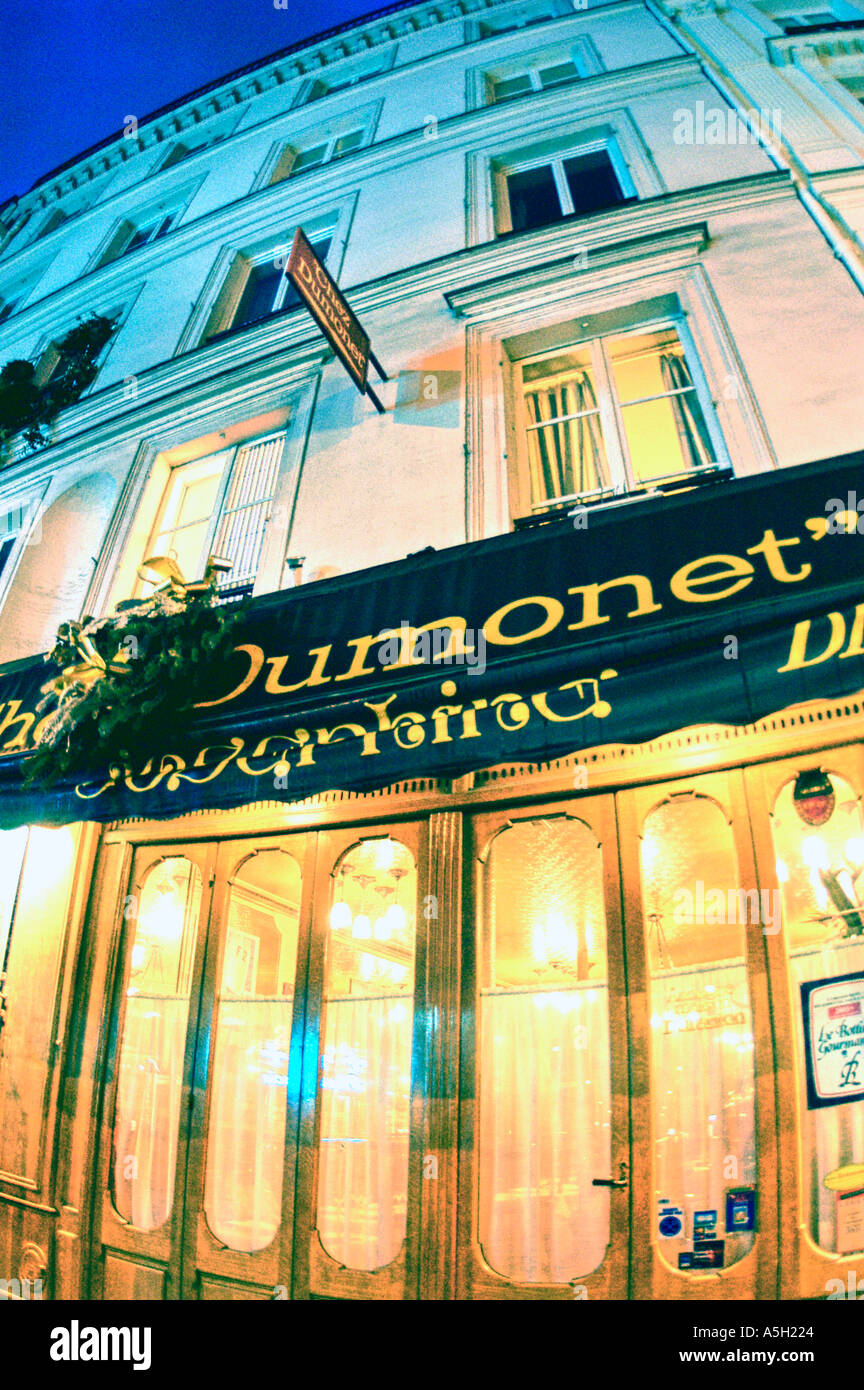 Paris France, French Bistro Restaurant, Outside Old Front Entrance Window 'Chez Dumonet' 'Lit up' Night, vintage Stock Photo