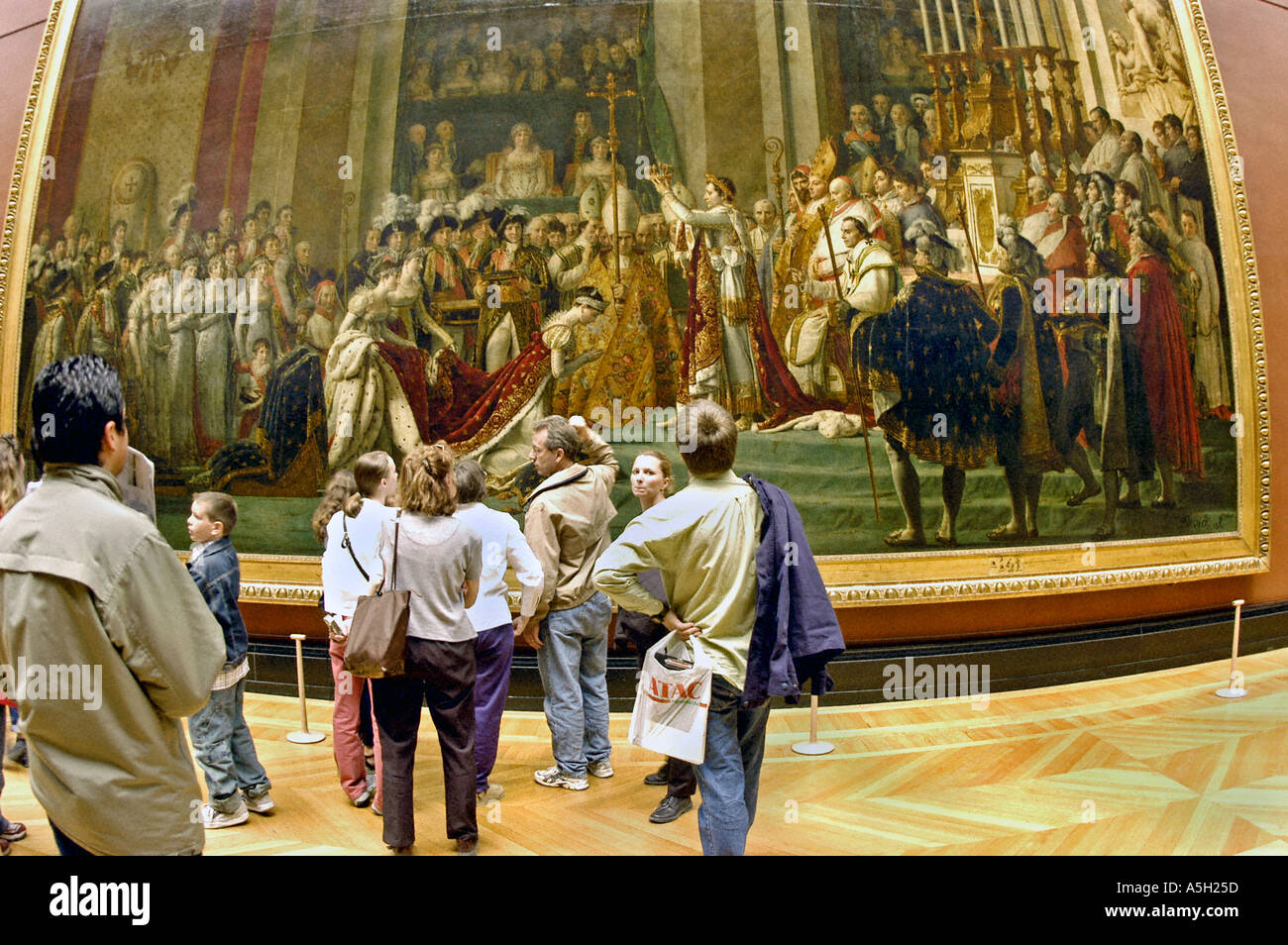 PARIS France, Louvre Museum Group Tourists Looking at 'French Classical Paintings' Exhibit Artist Credit: David Stock Photo