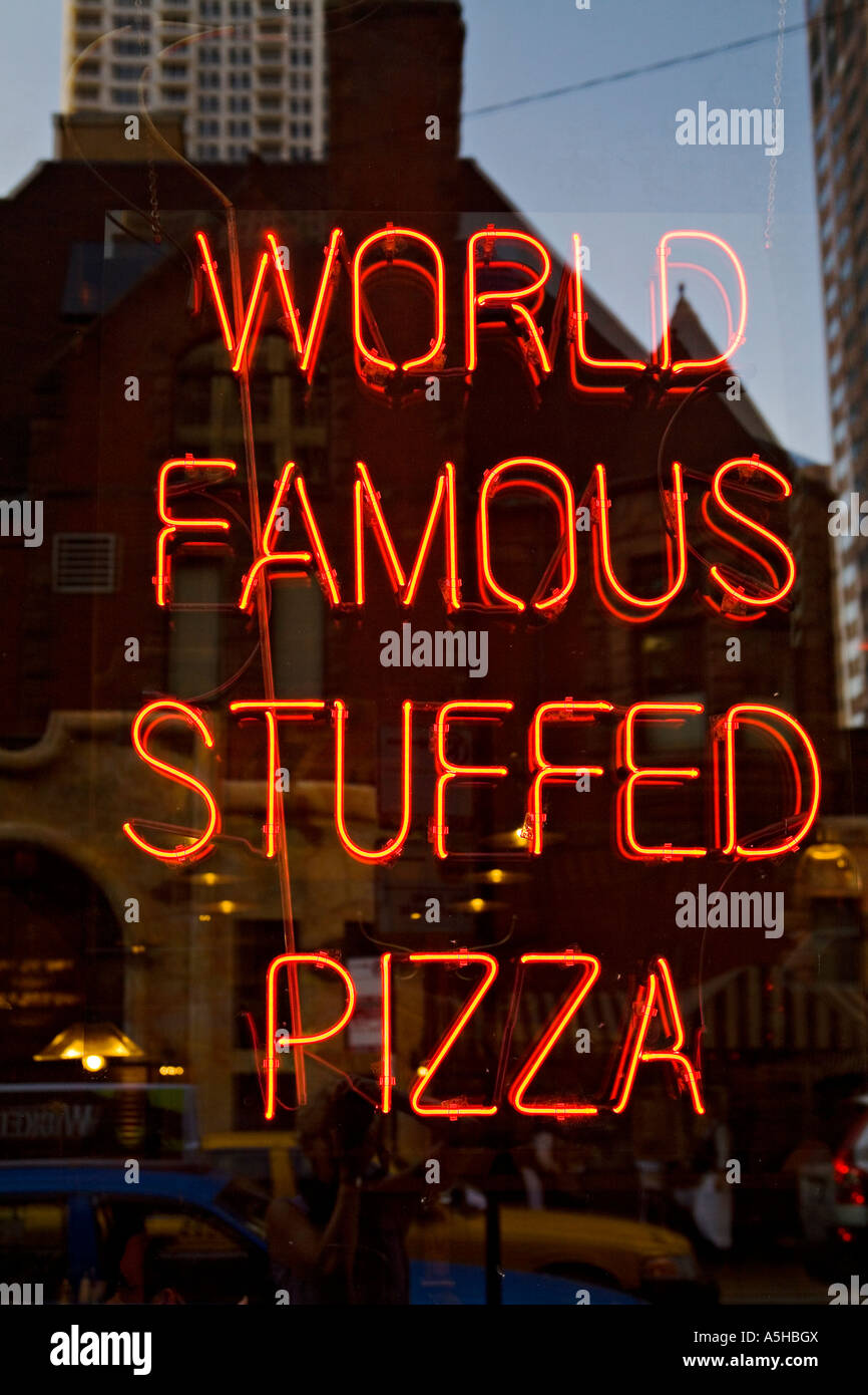 ILLINOIS Chicago World famous stuffed pizza neon sign in Giordanos stuffed pizza restaurant window on Rush Street north side Stock Photo