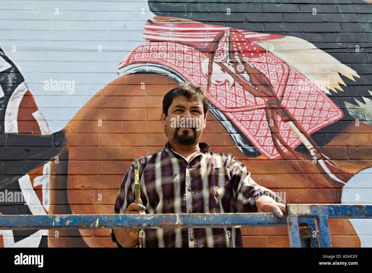 ILLINOIS Chicago Adult male paint outdoor mural using lift Pilsen