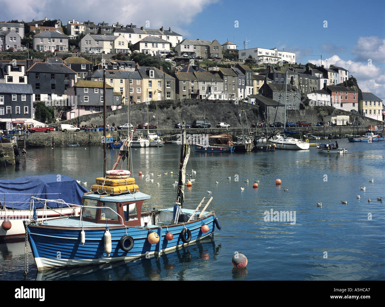 Fishing boats moored in harbour at Mevagissey in Cornwall in the UK Stock Photo