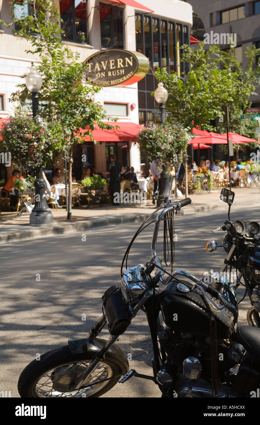 ILLINOIS Chicago Motorcycles parked in street across from Tavern on