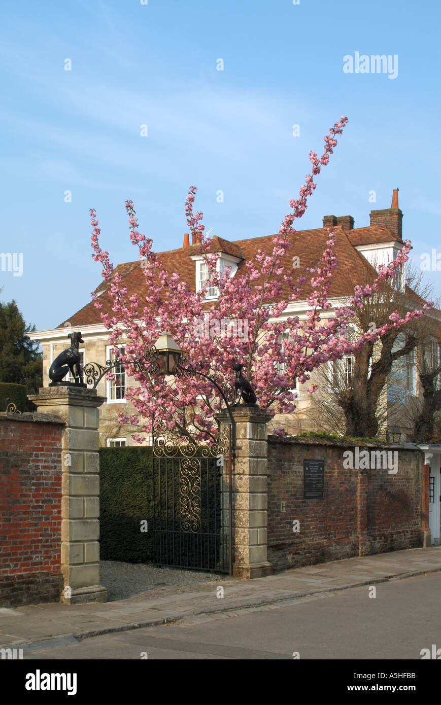 Salisbury Malmesbury House with entrance gate high brick wall and
