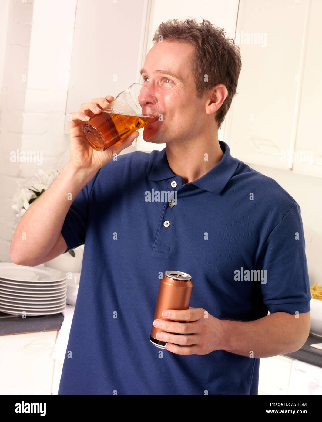 MAN DRINK BEER Stock Photo - Alamy