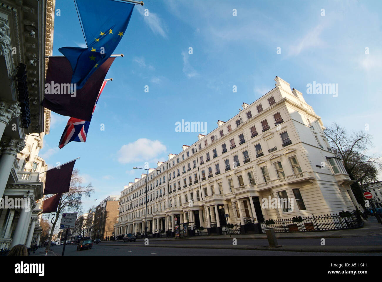 Bayswater District of London with Union Jack & EEC Flag, outside tourist hotels Stock Photo