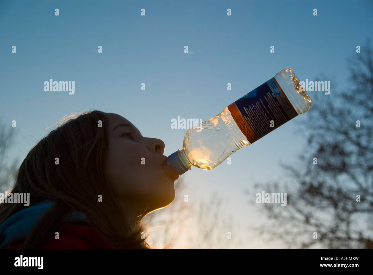 girl drinking water from bottle Stock Photo - Alamy