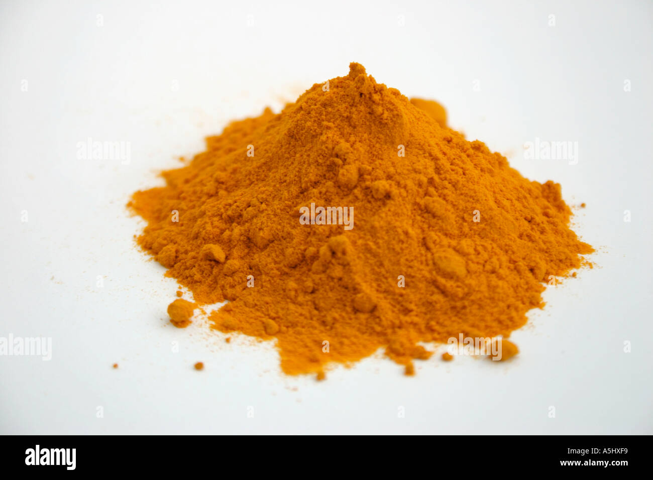 Pile of Ground Turmeric Stock Photo